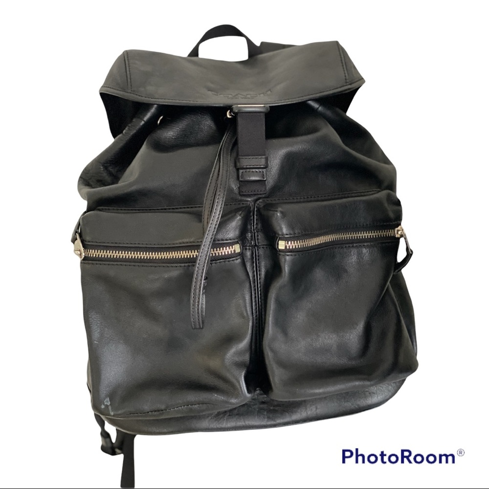 Coach black leather unisex backpack.